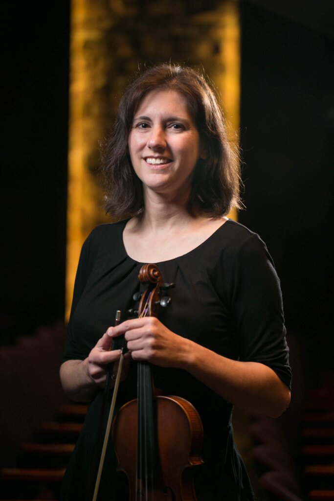 Photo of violinist Marjorie Garry with her instrument